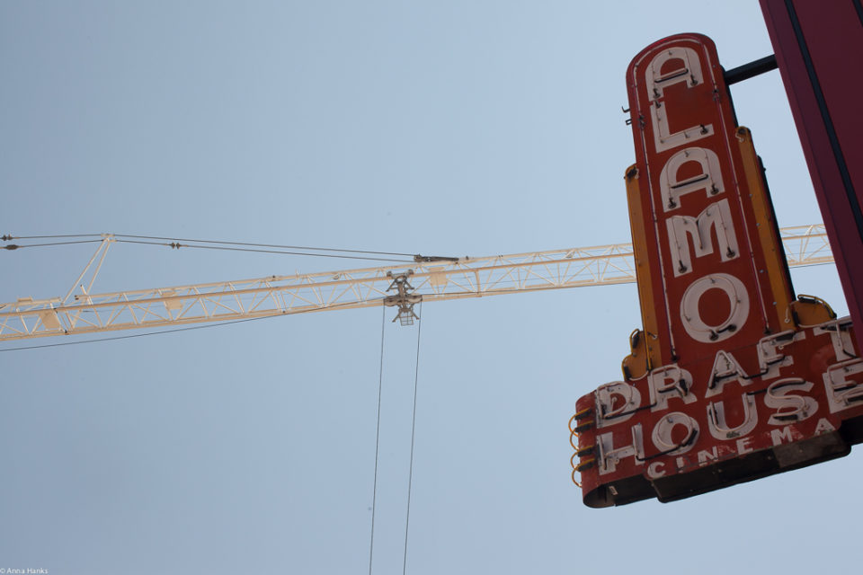 Alamo sign with crane
